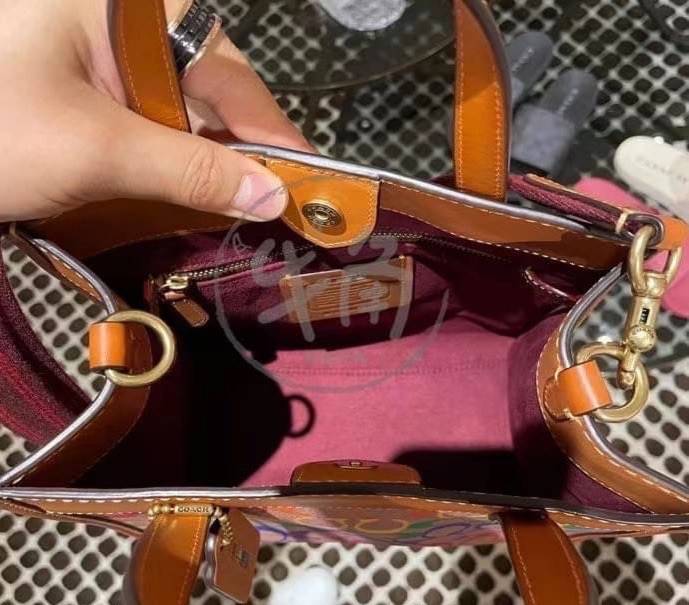 COACH C5142 COACH FIELD TOTE 22 IN RAINBOW SIGNATURE a celebration of equality, and authentic self-expression within the LGBTQIA+ community