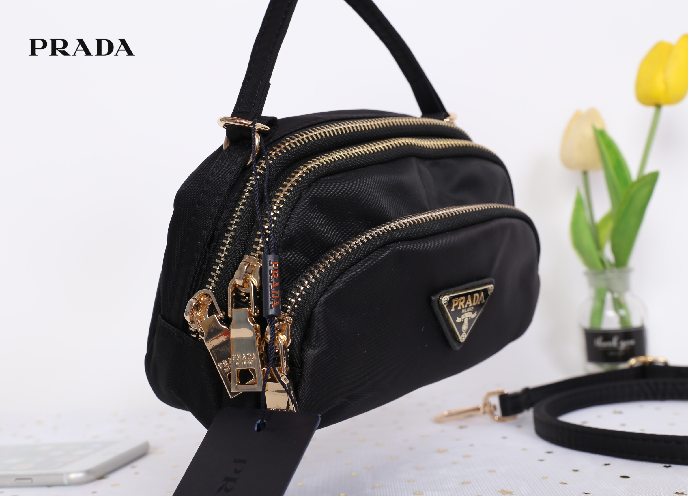 PRADA MINI 3 ZIPPER NYLON HANDBAG & SHOULDER BAG กระเป๋าถือหรือสะพายทรง dome size mini วัสดุ nylon มีหูหิ้วจับถนัดมือ