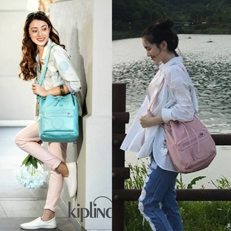 Kipling 2Way Bucket Bag กระเป๋าถือหรือสะพาย 2Way รุ่นใหม่ทรงขนมจีบวัสดุ Nylon & Polyester 100% น้ำหนักเบา ถือและสะพายได้หลายแบบจะใช้สายยาวสะพาย Crossbody หรือใช้สายคู่สะพายหลังแบบเป้ก็ดูดี หูจับถนัดมือสะพายไหล่ได้ เปิดปิดแบบ Drawstring พร้อมกระดุมแม่เหล็ก
