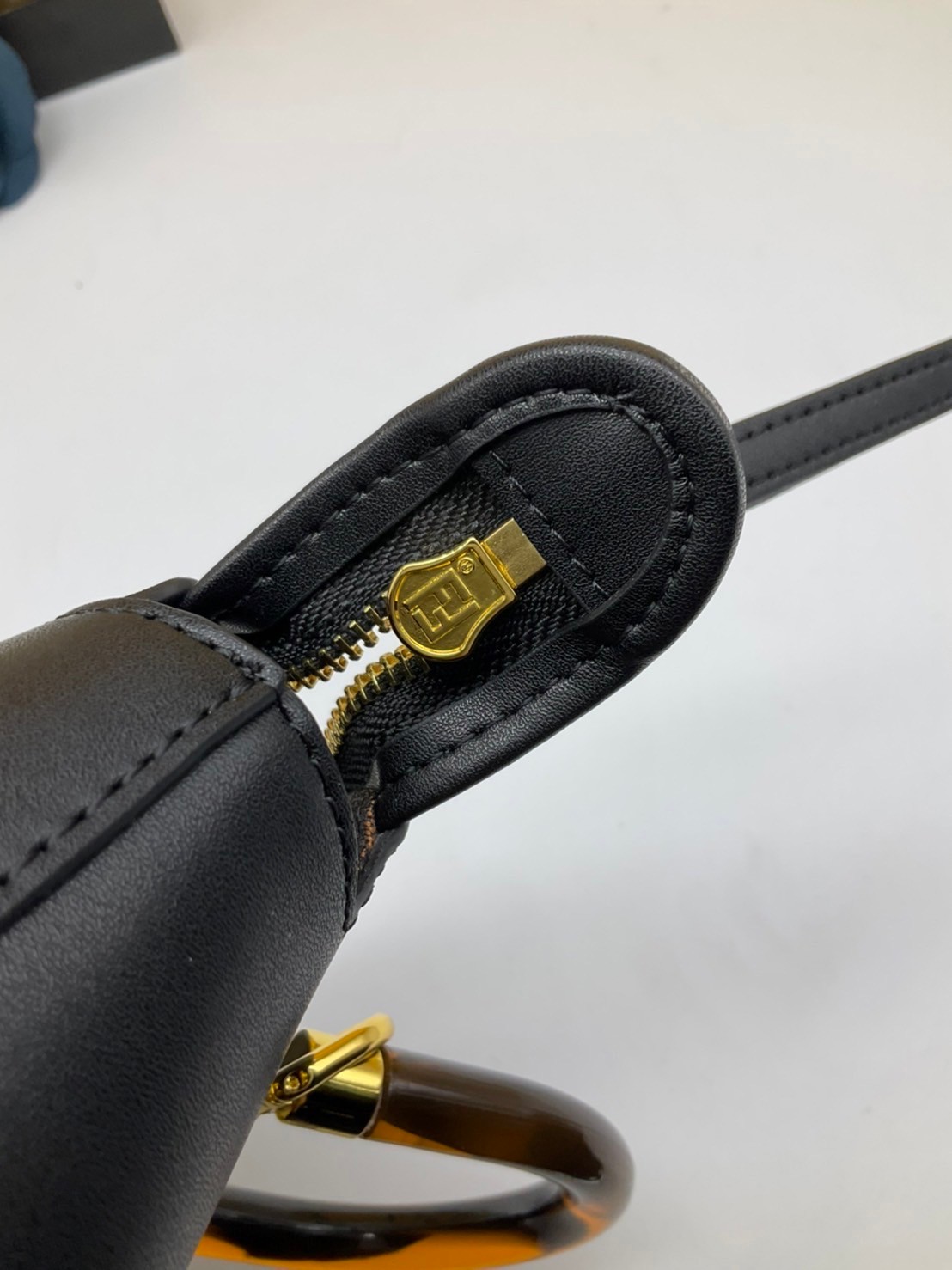 FENDI By The Way Mini Bag พร้อมส่งที่ไทย ภาพถ่ายจากงานขายจริง Iconic mini By The Way Boston bag made FENDI ROMA lettering and rigid tortoiseshell-effect plexiglass handles.