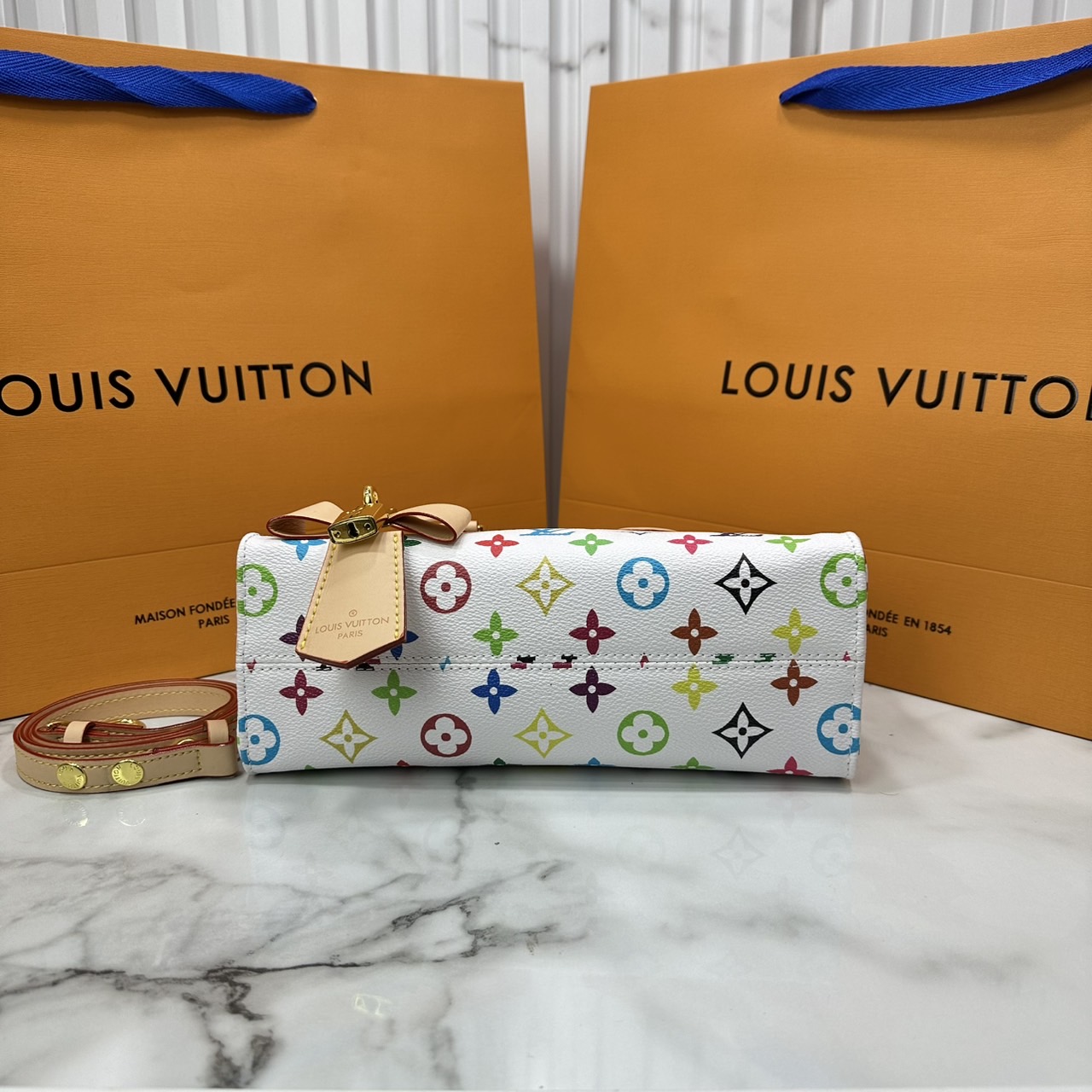 ORI หนังแท้ | LV x TM bolsa OnTheGo East West Multicolor กระเป๋าสะพายทรงโท้ทที่ใครเห็นต้องเป็นหลงรัก คอลใหม่ดีไซน์เฉดสีสันสดใส