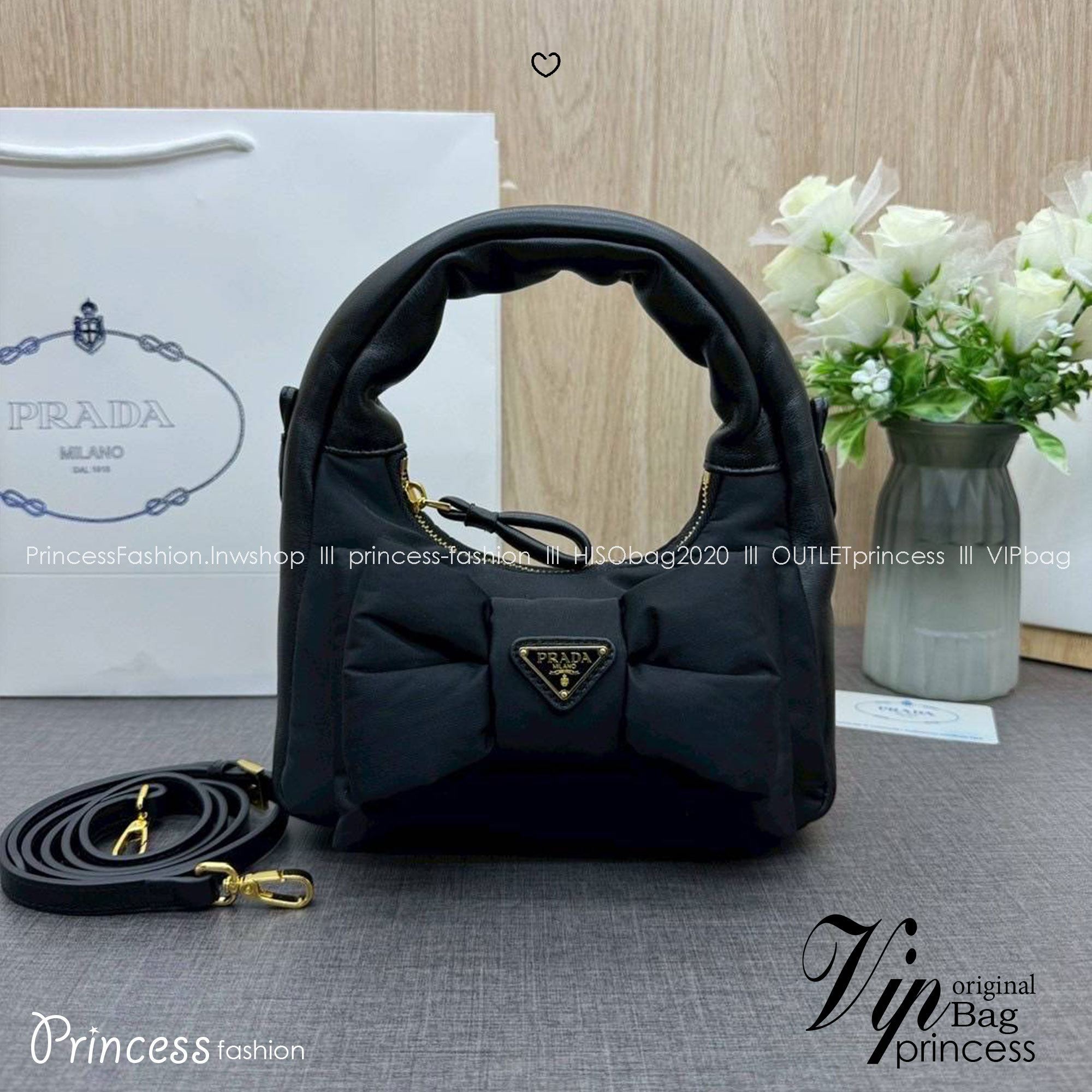 ORI หนังแท้ | Prada Re-Nylon and nappa leather mini-bag with bow กระเป๋าถือพร้อมสายสะพาย ผ้าไนล่อนบุนวม รูปทรงแบบโฮโบที่นุ่มนวลโดดเด่นด้วยโบว์ขนาดใหญ่ที่สื่อถึงความเป็นผู้หญิงสมัยใหม่