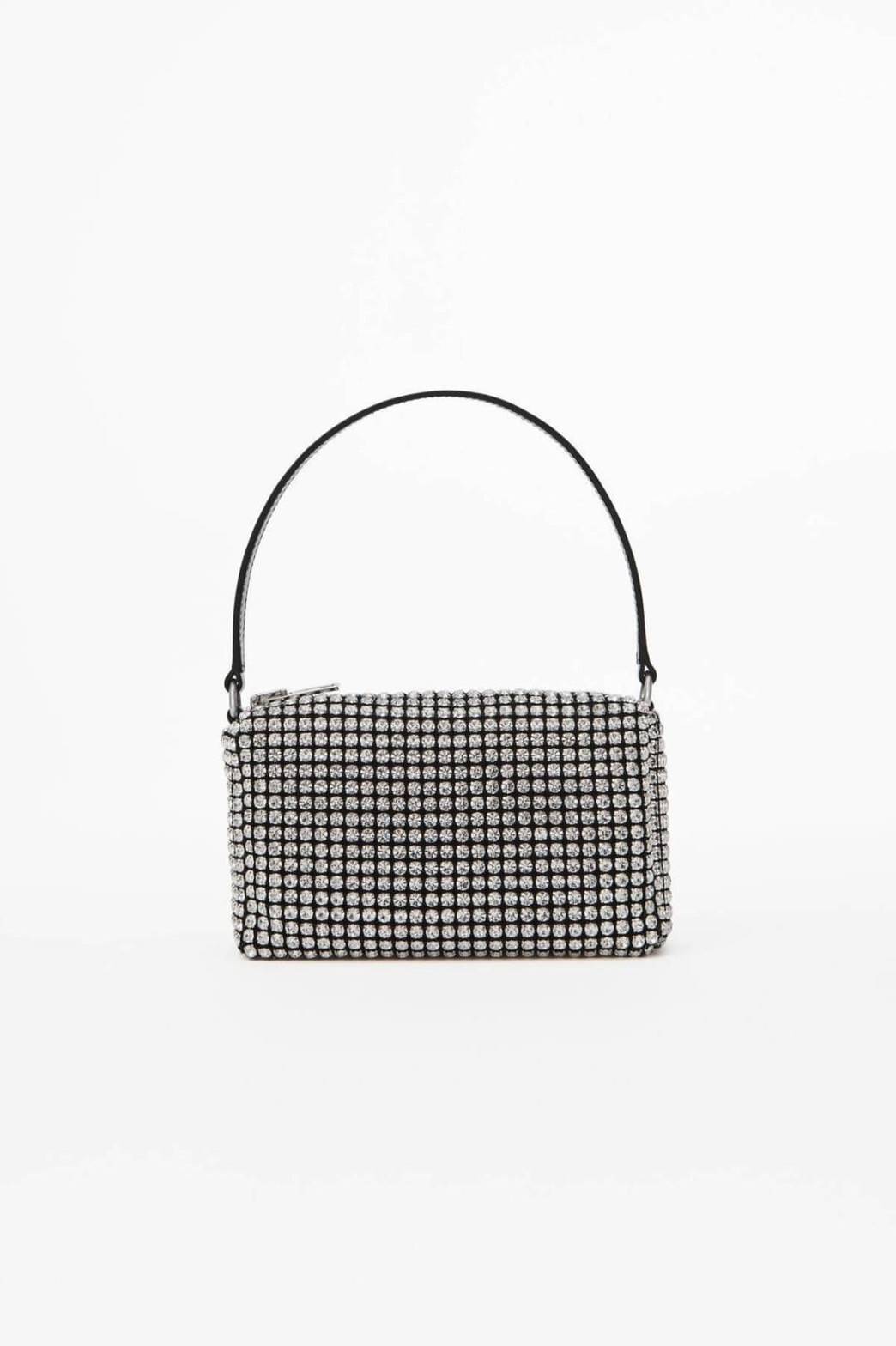 ALEXANDER WANG HEIRESS POUCH IN RHINESTONE MESH จัดให้แบบสุดตัว กับไอเท็มที่สาวๆต่างเรียกร้อง กับกระเป๋าพอชตกแต่งพลอยเทียม หรูหรา โดดเด่น ดูแพง ด้วยการตัดเย็บเรียงร้อยลงบนตาข่ายเนื้อละเอียด ทำให้ดูดีมีราคางดงามจริงๆ เปิด-ปิดด้วยซิป ขนาดกำลังสวย ภายในเป็นช