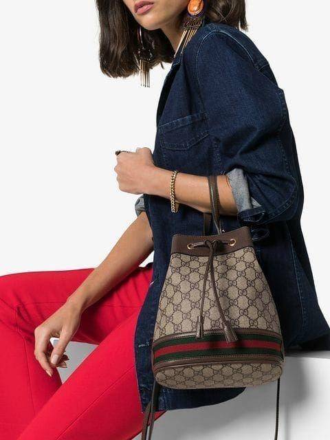 GUCCI Ophidia mini small GG bucket bag กระเป๋าถือหรือสะพายข้าง ขนาดเล็ก ทรงขนมจีบ วัสดุผ้าใบ+หนังแท้ พร้อมแถบลายทางสีเขียวและสีแดงด้านล่าง ด้านในโล่ง มี1ช่องเล็ก สายยาวถอดสายไม่ได้ ปรับระดับได้ ใบนี้เรียบหรูดูดีสุดๆไม่ควรพลาดค่า