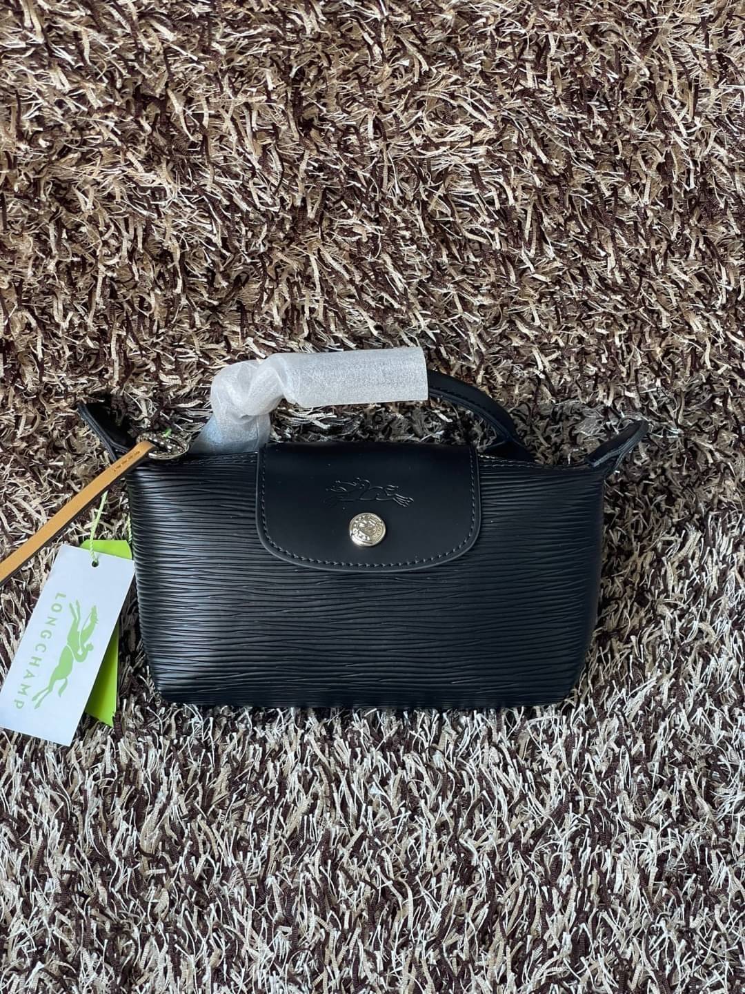 LONGCHAMP LE PLIAGE CITY POUCH WITH HANDLE Taupe - Canvas (ไม่มีสายยาว) กระเป๋าเครื่องสำอางแบบมีซิปพร้อมหูหิ้วใบนี้เหมาะสำหรับการจัดระเบียบกระเป๋าของคุณ