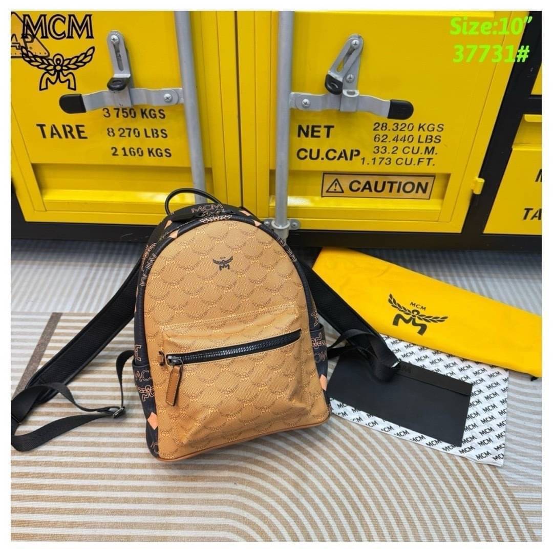 ORI | M.C.M Stark Backpack in Monogram Mix กระเป๋าเป้แมกซี่คอลใหม่ โดดเด่นด้วยดีไซน์สีดำด้านข้างและสายกระเป๋าตัดสีกันได้อย่างลงตัว Best seller Unisex ของงานเป้จริงๆ