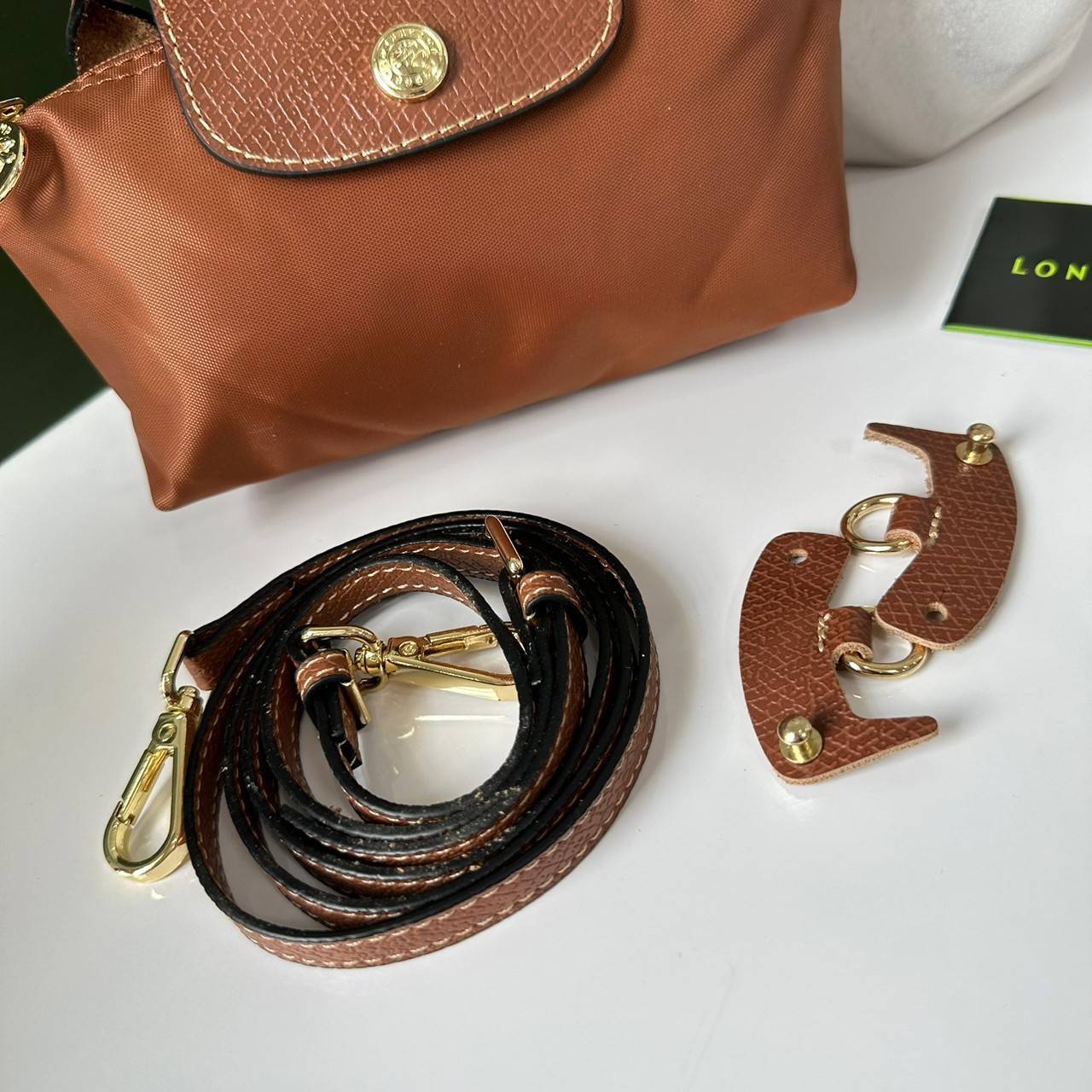 LONGCHAMP LE PLIAGE ORIGINAL Pouch with handle กระเป๋าใบเล็กขนาดกระทัดเหมาะกับใส่ของจำเป็นจุกจิก กันน้ำได้ พร้อมส่ง