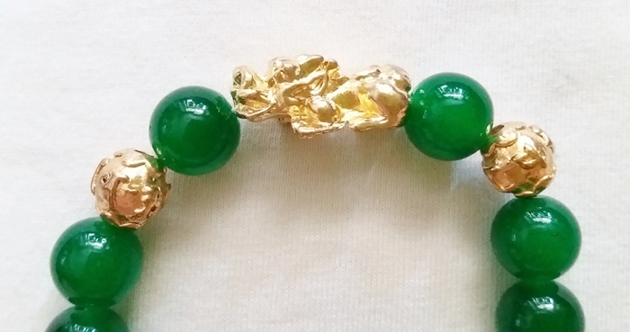 สร้อยข้อมือปี่เซี้ยะเดี่ยวสีทองหินโมราสีเขียว ช่วยปกป้องคุ้มครอง แก้ชงปีกุน ปี2562 พร้อมใบคาถาค่ะ