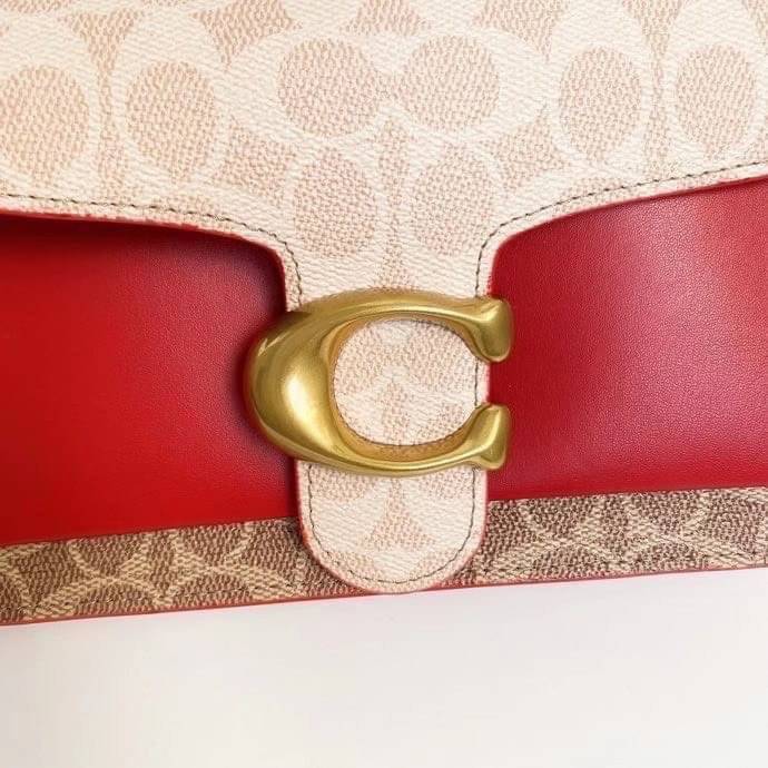 Coach Tabby Shoulder Bag 26 Polished pebble leather, suede and refined calf leather Inside zip and multifunction pockets