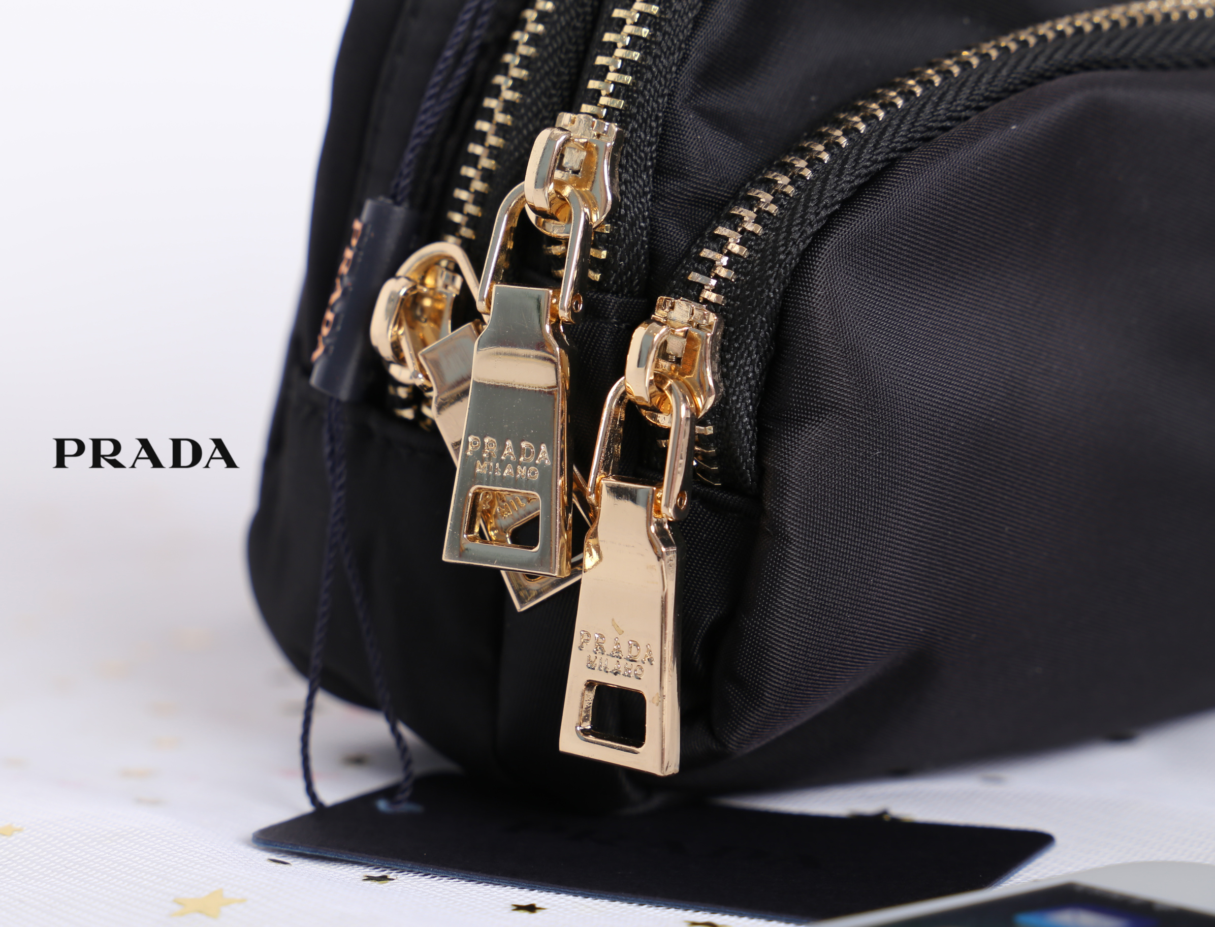 PRADA MINI 3 ZIPPER NYLON HANDBAG & SHOULDER BAG กระเป๋าถือหรือสะพายทรง dome size mini วัสดุ nylon มีหูหิ้วจับถนัดมือ