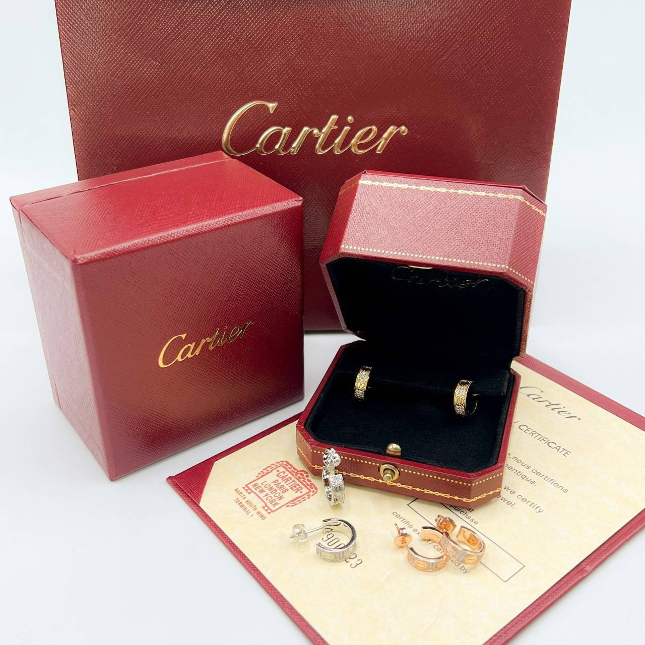 CARTIER LOVE EARRINGS ต่างหูคาเทียร์ รุ่น LOVE มีเพชร พร้อมกล่อง ภาพถ่ายจากงานจริง งานปั้มวัสดุโลหะเคลือบขึ้นเงาตามรูป ใช้งานต่างประเทศได้