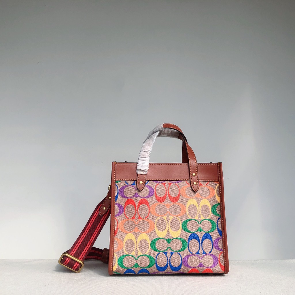 COACH C5142 COACH FIELD TOTE 22 IN RAINBOW SIGNATURE a celebration of equality, and authentic self-expression within the LGBTQIA+ community