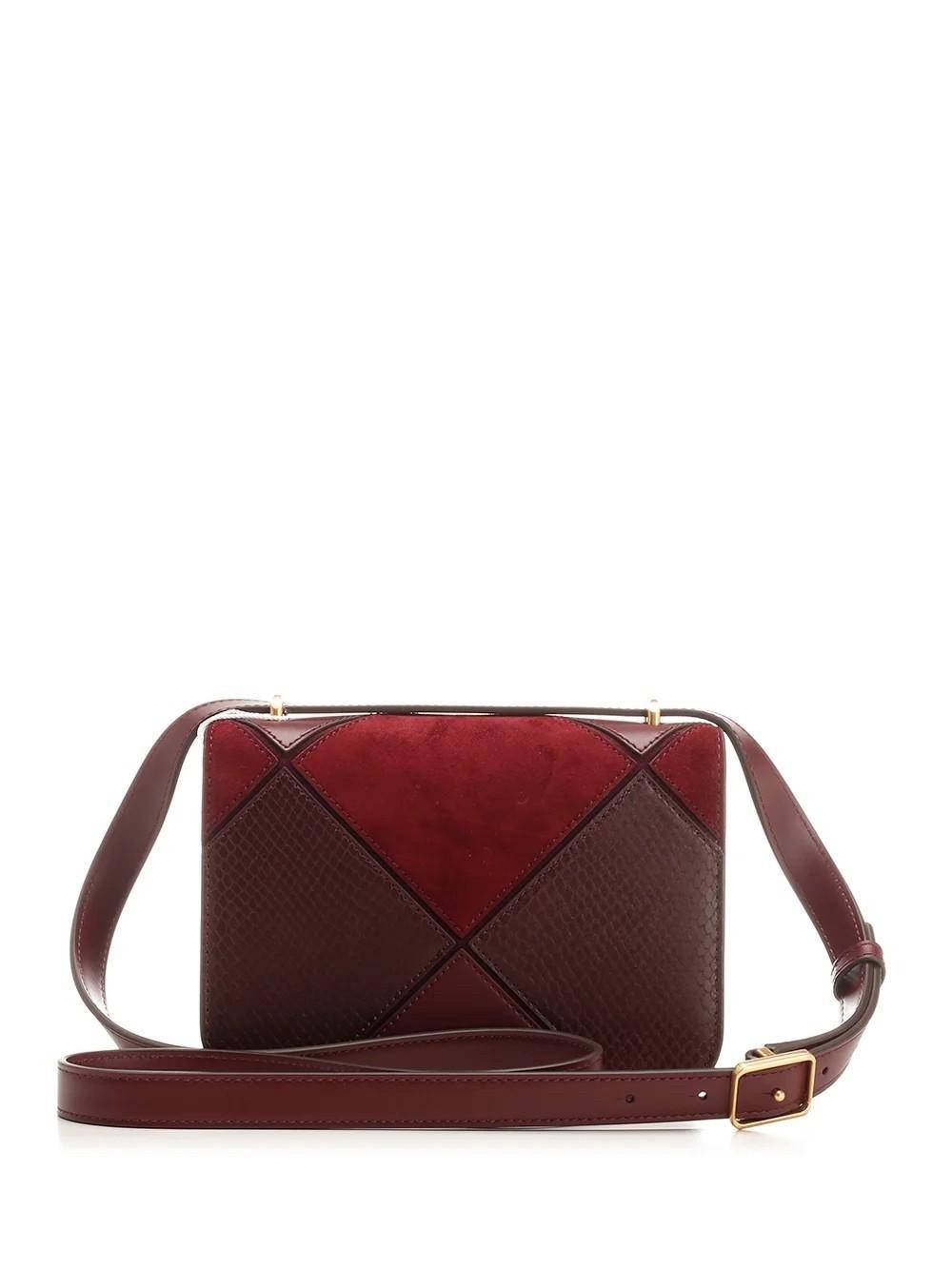 Tory Burch Small Eleanor Patchwork Convertible Shoulder Bag กระเป๋าทรงกล่อง ใบเล็กตัดเย็บจากหนังลูกวัว หนังกลับ และหนังงูนูน พร้อมขอบทาสีด้วยมือ อัญมณีแห่งหัตถศิลป์ ออกแบบมาให้พกพาสะดวก อะไหล่ทองเหลือง