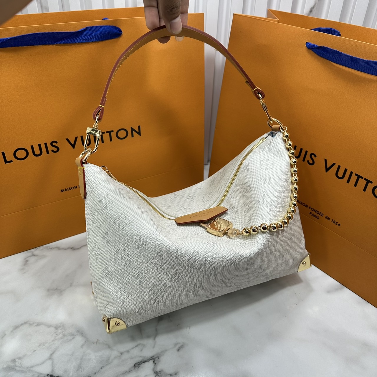 ORI หนังแท้ | LV Bobo Trunk bag Monogram Heritage Canvas / LV Hobob Bag กระเป๋าถือ กระเป๋าสะพายทรงโฮโบ ไอเท็มใหม่ล่าสุดจากตระกูล Trunk รังสรรค์จาก Monogram Heritage แคนวาส มุมกระเป๋าที่ได้แรงบันดาลใจจากทรังก์