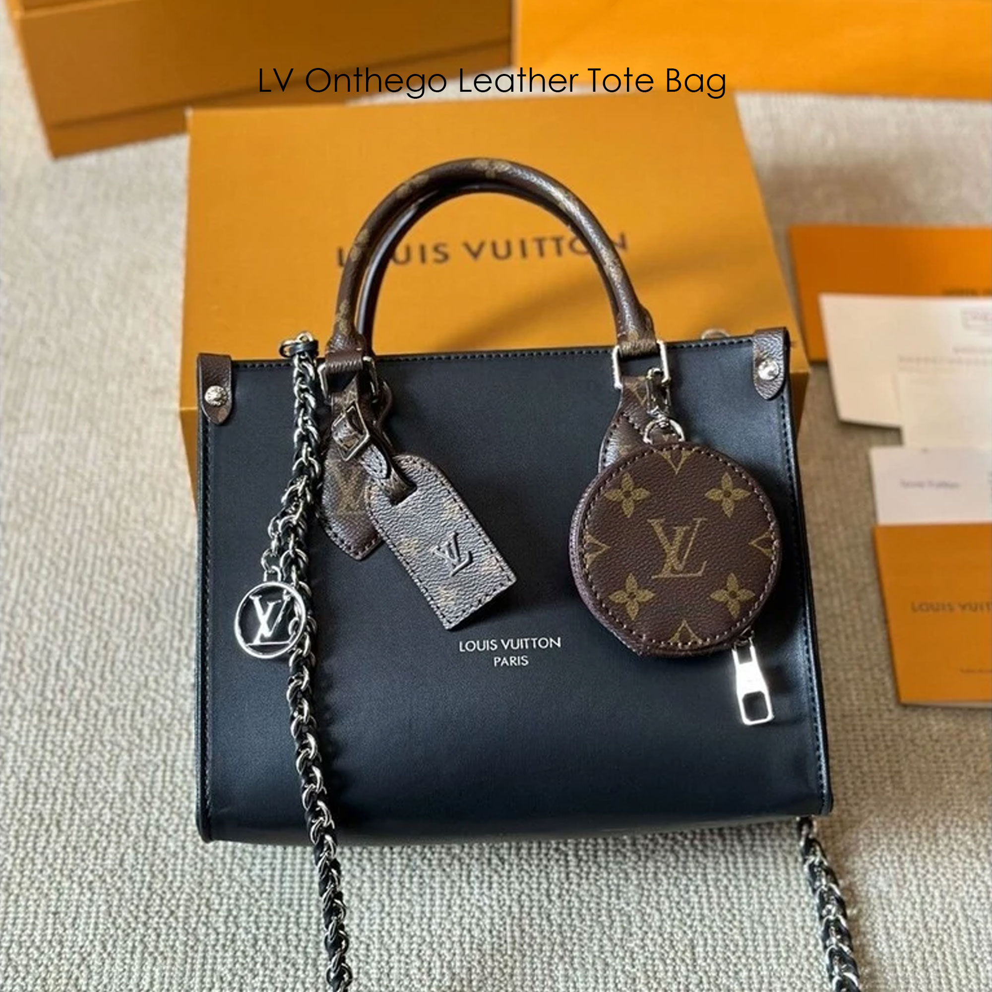 LV Onthego Leather Tote Bag กระเป๋าทรงโท้ทดีไซน์ใหม่ สีดำสุดคลาสสิก พร้อมสายสะพายโซ่ร้อยหนังสีดำเข้าเซ็ทและใบลูกลายโมโนแกรมตัดสีกันได้อย่างลงตัว ตอบโจทย์ได้ทุกลุค ทุกสไตล์