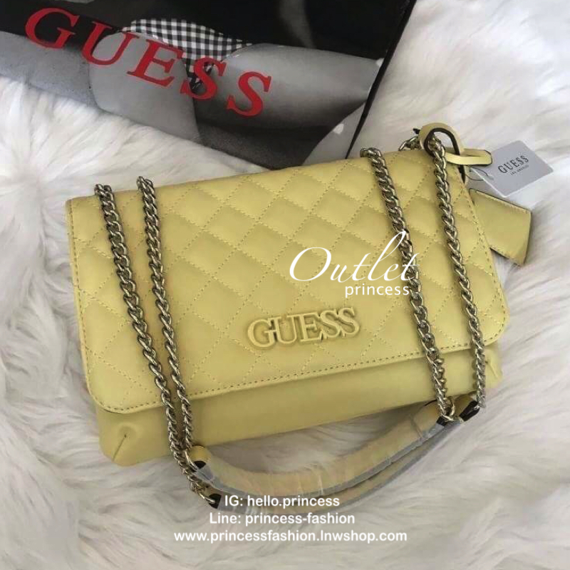 Guess Elliana Convertible Flap Over Crossbody กระเป๋าสะพายรุ่นใหม่จาก Guess factory รุ่นนี้สามารถสะพายได้ทั้งสายคู่และสายเดี่ยว สายสะพายโซ่ต่อหนังไม่เจ็บบ่า ด้านหน้าประดับtagโลหะหุ้มหนังถอดออกได้ วัสดุหนังpu ลายตาราง เรียบนิ่ม เปิดปิดกระเป๋าด้วยกระดุมแม่เ