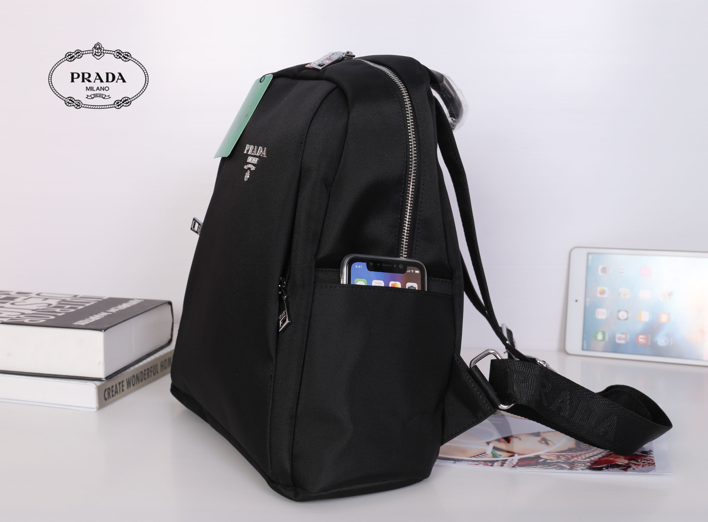 PRADA NYLON BACKPACK กระเป๋าเป้ Limited edition VIP Gift With Purchase (GWP) จากเคาน์เตอร์แบรนด์วัสดุ Nylon&Polyester เนื้อหนาคุณภาพดี น้ำหนักเบา ด้านหน้าประดับโลโก้แบรนด์ เปิดปิดด้วยซิป หูจับคุณภาพดีแข็งแรง สายสะพายหลังลายแบรนด์เลื่อนปรับได้ ด้านในโล่งกว