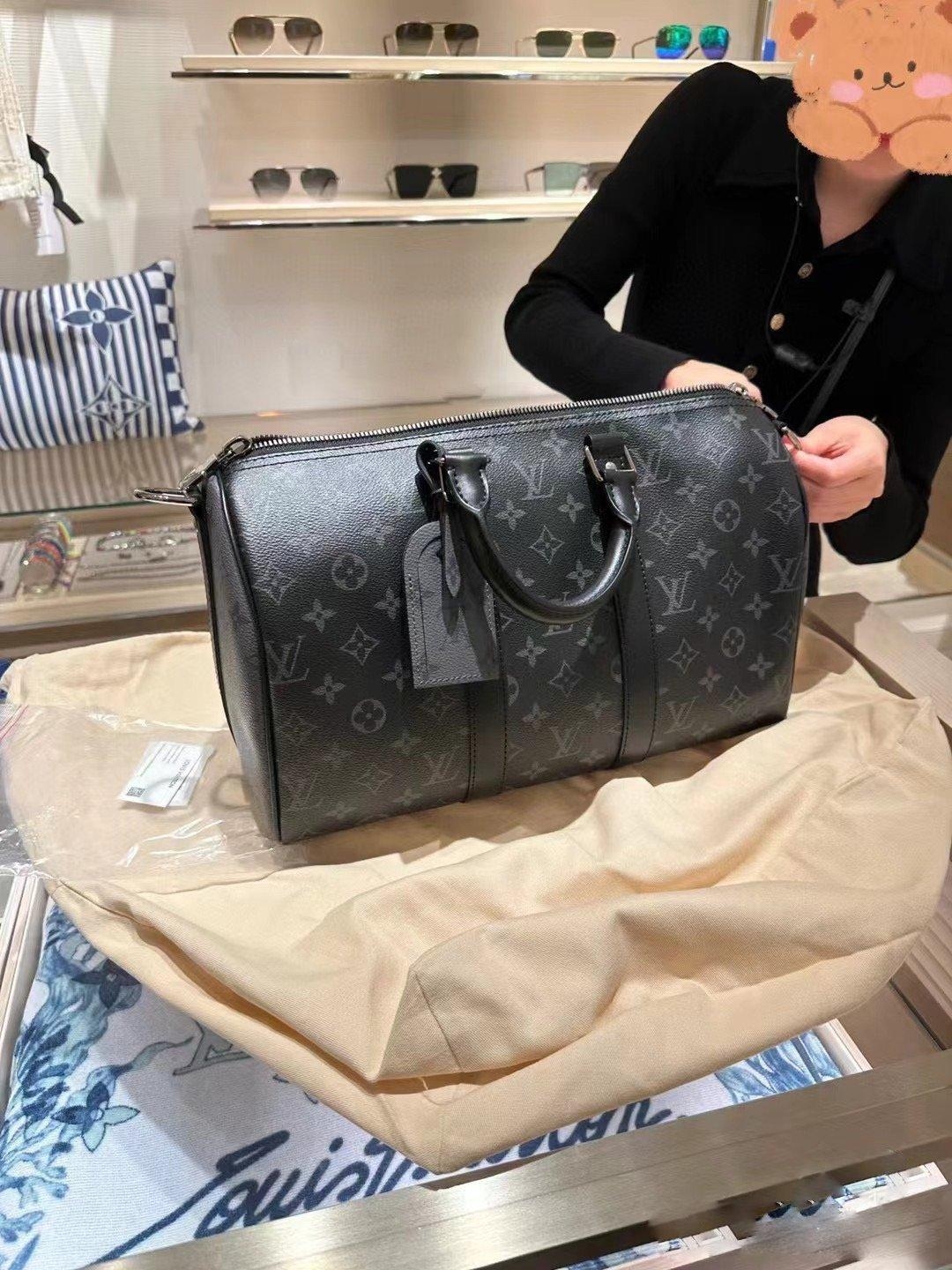 LV Keepall Bandouliere / LV Travel Bag พร้อมส่ง กระเป๋าเดินทางสุดคลาสสิค เรียบหรูมีระดับในวัสดุ Monogram Eclipse แคนวาส