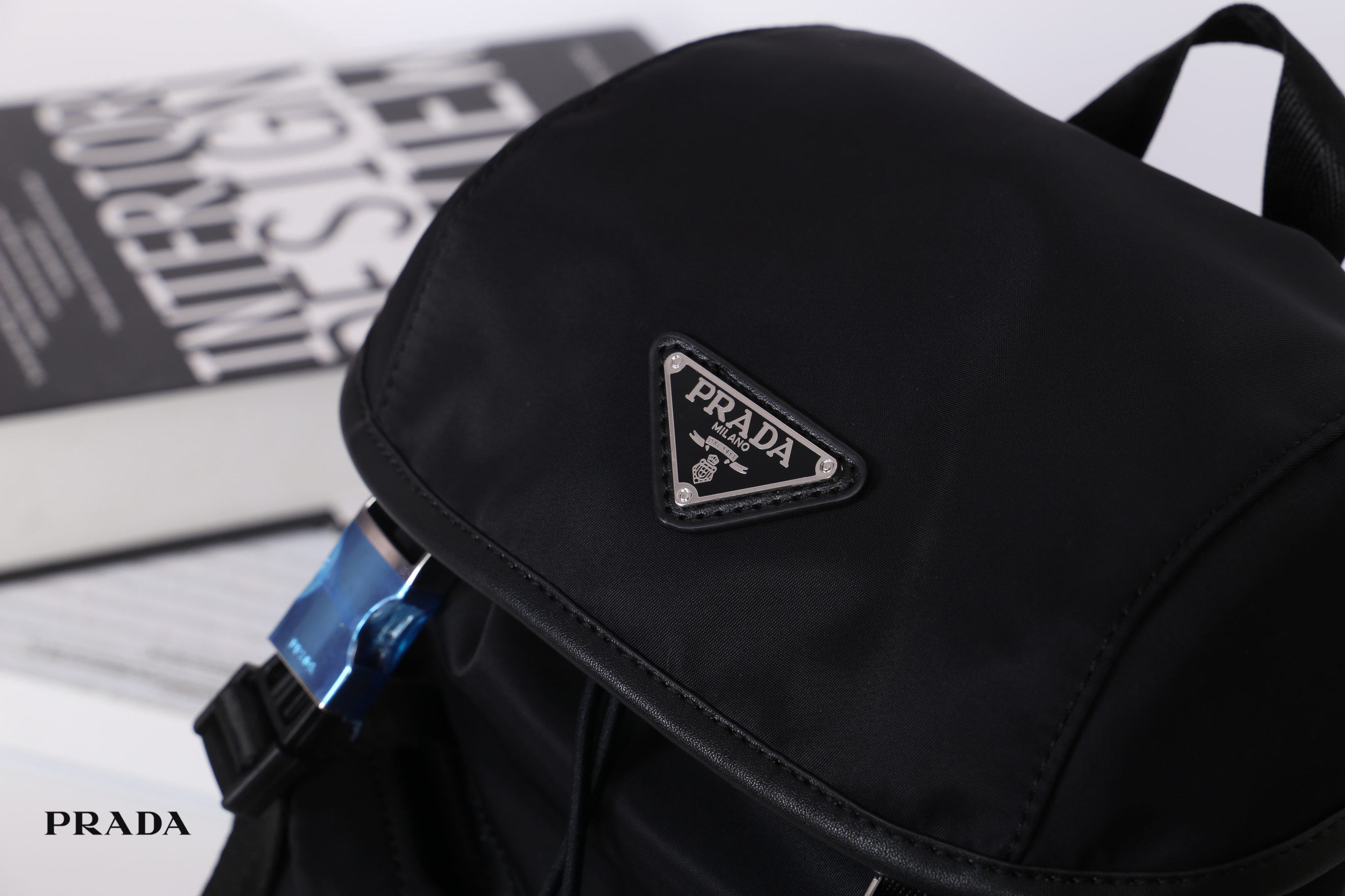 PRADA NYLON MINI BACKPACK สินค้า Premium gift จากเค้าเตอร์แบรนด์ต่างประเทศ รุ่น Limited edition กระเป๋าสะพายเป้ Size mini ขนาดกำลังน่ารัก ที่ฮ๊อตสุดๆ วัสดุเป็น Nylon เนื้อหนา คุณภาพดี ขนาดกะทัดรัด พกพาสะดวก น้ำหนักเบา ด้านหน้าติดโลโก้แบรนด์ อะไหล่เงินสวยห