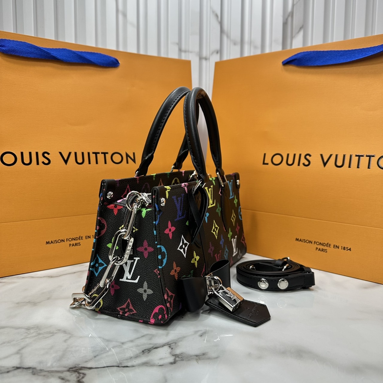 ORI หนังแท้ | LV x TM bolsa OnTheGo East West Multicolor กระเป๋าสะพายทรงโท้ทที่ใครเห็นต้องเป็นหลงรัก คอลใหม่ดีไซน์เฉดสีสันสดใส