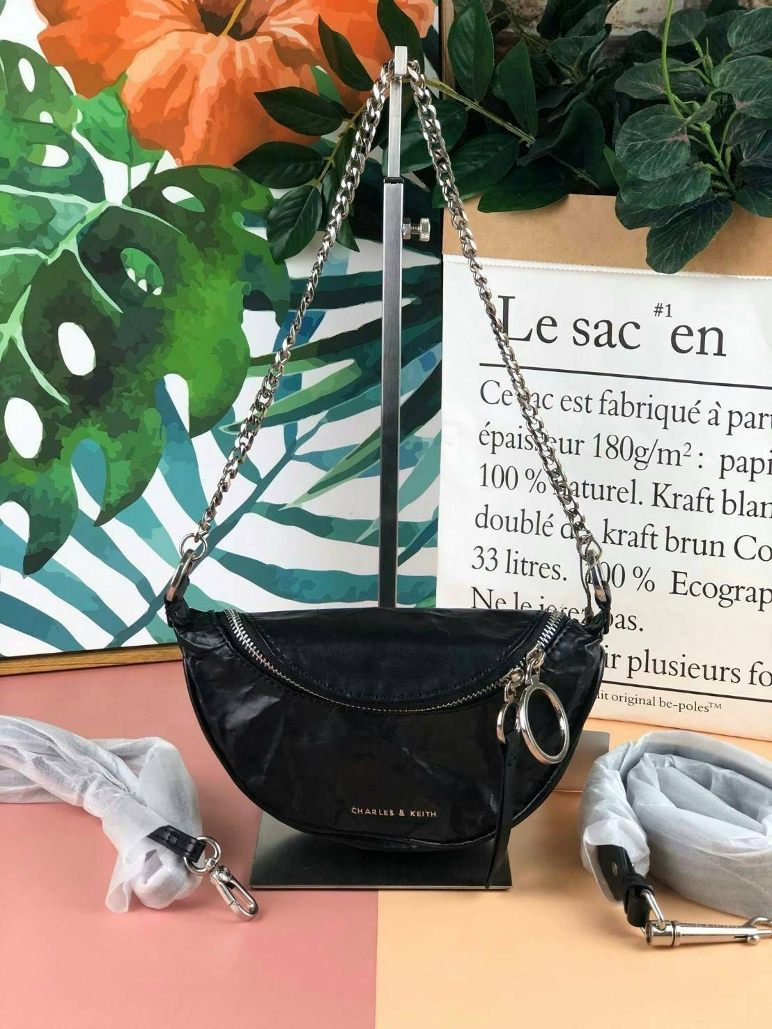 CHARLES & KEITH WRINKLED EFFECT RING ZIP TASSEL CROSSBODY BAG กระเป๋าสาระพัดประโยชน์ ใช้คาเอว คาดอก หรือจะสะพายแบบครอสบอดี้ได้ค่า 💥💥 มีโลโก้แบรนด์ที่ด้านหน้า เปิดปิดแบบซิปคู่เก๋ๆ ด้านในมีช่องใส่บัตรได้ 3 ช่อง รุ่นนี้ใส่ iPhone plus ได้พอดี