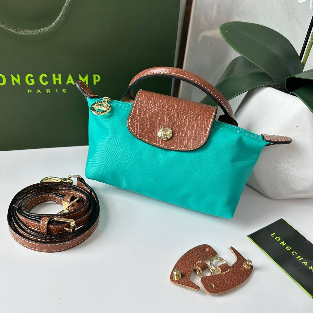 LONGCHAMP LE PLIAGE ORIGINAL Pouch with handle กระเป๋าใบเล็กขนาดกระทัดเหมาะกับใส่ของจำเป็นจุกจิก กันน้ำได้ พร้อมส่ง
