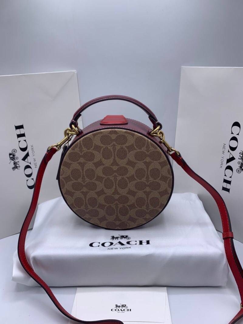 COACH LUNAR NEW YEAR CIRCLE BAG IN SIGNATURE CANVAS กระเป๋าทรงกลม ถือและสะพายข้างได้ วัสดุหนังแท้ ลาย C สวยหรู!! ตามแบบฉบับแบรนด์ ดูแพงมาก ราคาสุดคุ้มแบบนี้ ต้องมีไว้ใช้สักใบน้า!!