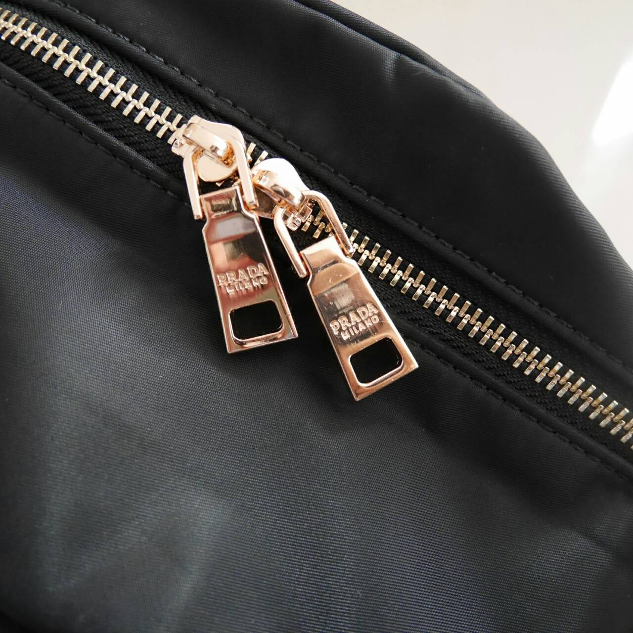 Don't Miss! กลายเป็นรุ่นยอดฮิต ไปแล้วคะ สำหรับ PRADA NYLON MINI BACKPACK กระเป๋าสะพายเป้ Size mini พรีเมี่ยมกิ้ฟจากเคาน์เตอร์ต่างประเทศรุ่น Limited edition ที่ฮ๊อตสุดๆ วัสดุเป็น Nylon เนื้อหนาคุณภาพดีตขนาดกะทัดรัดกำลังดี น้ำหนักเบา ด้านหน้ามาพร้อมโลโ