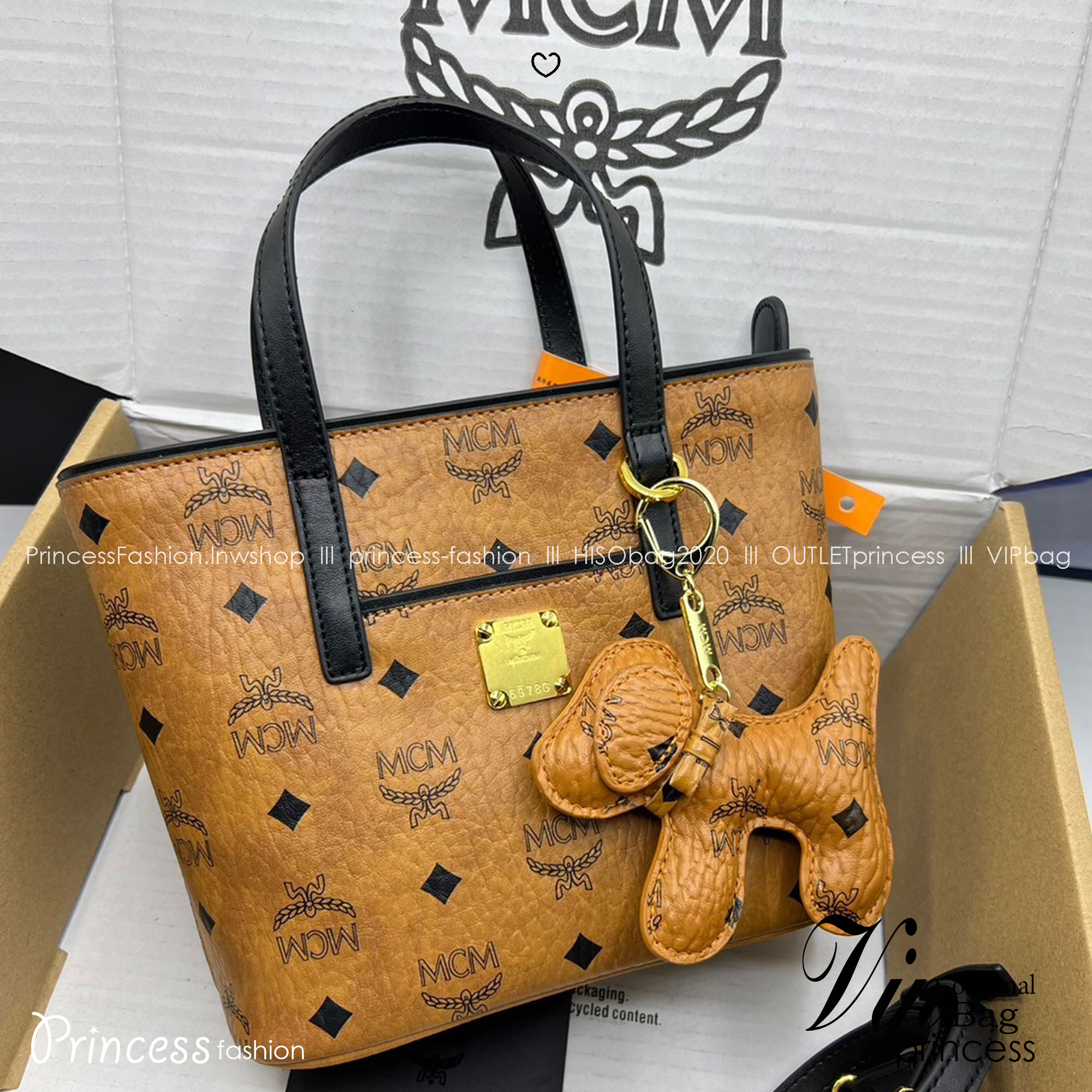 M.C.M Mini Anya Top Zip Shopper in Visetos กระเป๋าทรงโท้ท พร้อมพวงกุญแจน้องหมาห้อย พิมพ์ลายสวยงาม เกรดท็อปออริ 1:1 สลับแท้