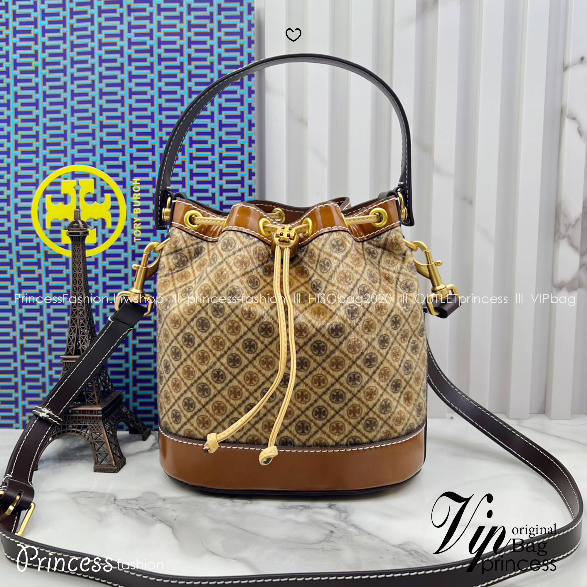 TOP ORI หนังแท้ | เกรดดีสุด TORY BURCH T Monogram Calf Hair Bucket Bag caramel brown colour-block panelled design ใหม่ล่าสุดได้สวยก่อนใคร กับกระเป๋าบัคเก็ตยอดฮิตดีไซน์ใหม่ แต่งโลโก้ด้วยขนเฟอร์สวยหรู โทนสีน้ำตาลขับผิว