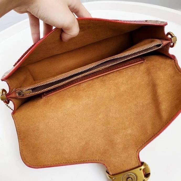 Coach Tabby Shoulder Bag 26 Polished pebble leather, suede and refined calf leather Inside zip and multifunction pockets