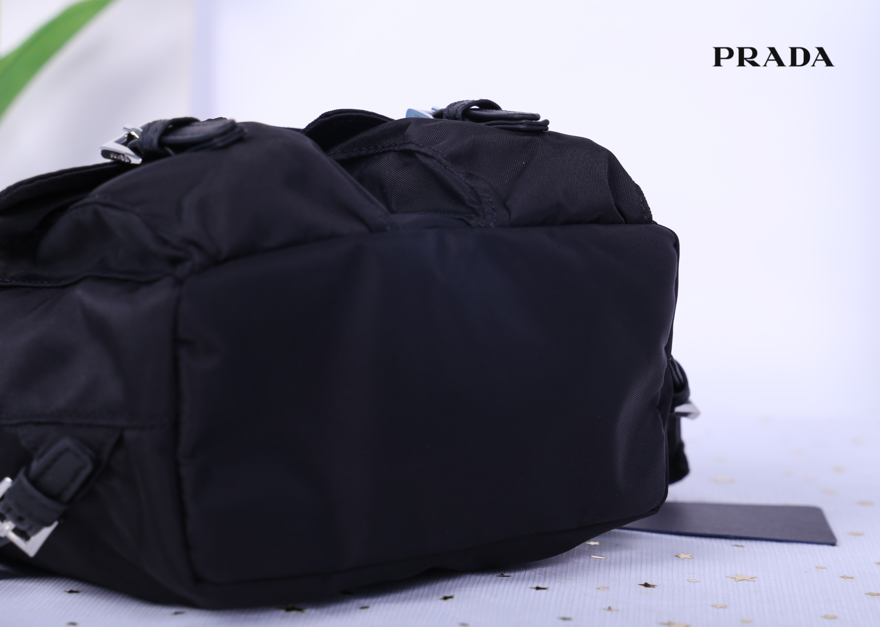 Prada Black Nylon Mini Double Buckle Backpack Crossbody Bag รุ่นนี้เป็นทรงเป้มินิน่ารักๆๆ ด้านในโล่งกว้าง ซับด้านในพิมพ์ลายแบรนด์ ใส่ของจุกจิง โทรศัพท์ กระเป๋าตังใบสั้น เครื่องสำอาง ได้แบบสบาย อะไหล่เงินทั้งใบ บอกเลยว่ารุ่นนี้สวย น่ารัก จะถือหรือสะพายก็ดู
