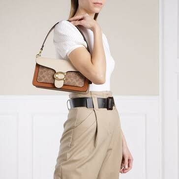 COACH TABBY SHOULDER BAG 26 IN SIGNATURE CANVAS WITH BEADCHAIN (6793,91215) กระเป๋าสะพายไหล่ ดีไซน์วินเทจย้อนยุค สวยคมชัด คลาสสิคใช้ได้ทุกลุค วัสดุหนังแท้สลับหนังแคนวาสเคลือบลาย เปิด-ปิดด้วยแม่เหล็กในตัว รับรองแน่นหนา ด้านหลังมีช่องแยก ภายในเป็นช่องโล่ง ข