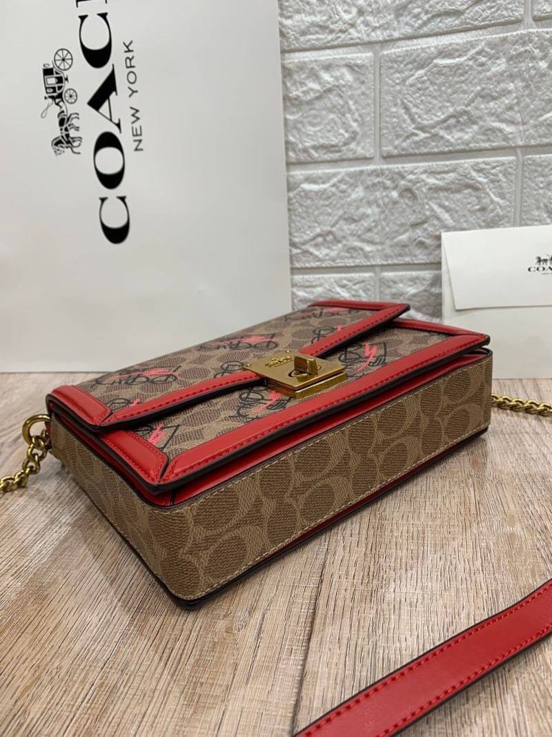 COACH HUTTON SHOULDER BAG IN SIGNATURE CANVAS