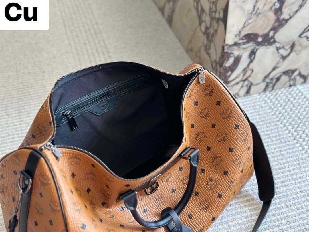 ORI | M.C.M NOMAD WEEKENDER / M.C.M Travel Bag กระเป๋าเดินทางใบใหญ่ ดีไซน์คลาสสิคสายสปอร์ต สายลุย ต้องมารวมกันตรงนี้เลยจ้า ดีไซน์โฉบเฉี่ยว ดูเท่