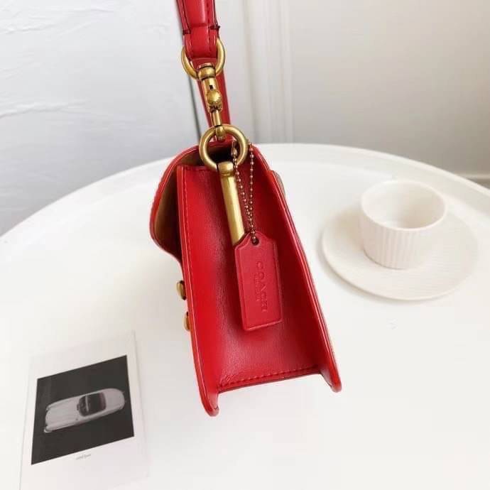 Coach Tabby Shoulder Bag 26 Polished pebble leather, suede and refined calf leather Inside zip and multifunction pockets