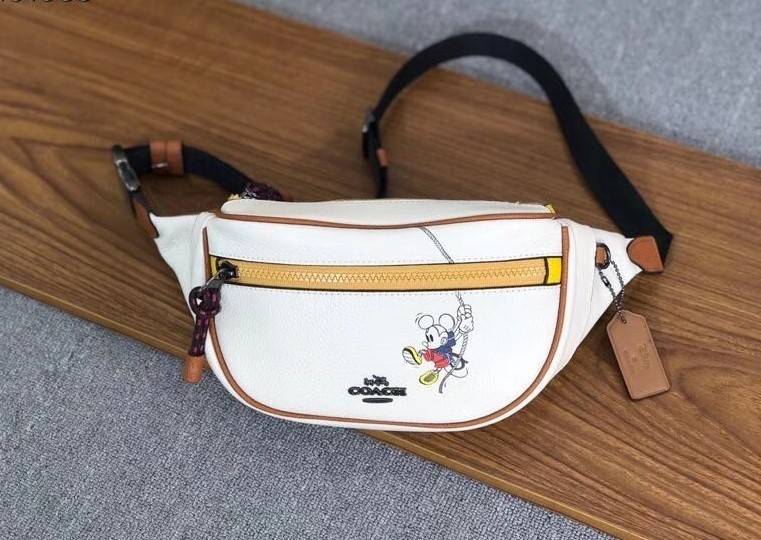 ของแท้ 💯% Coach Micky Mouse Disney Chest Bag 3747 collection Japan Limited Edition Women’s Full Leather กระเป๋าสะพายคาดอก/เอว ขนาดพอเหมาะ ใส่มือถือ iphone+ เปิดปิดด้วยซิป ด้านหน้ามี Logo mickey mouse