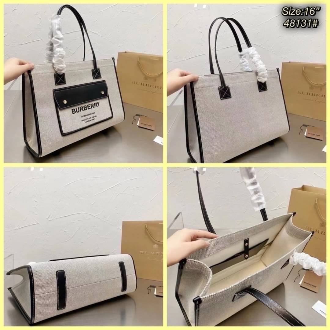 Burberry Freya Canvas Tote Bag Large กระเป๋าสะพายทรงโท้ทใบใหญ่จุใจ ดีไซน์ทรงเหลี่ยมสวยอยู่ทรง ด้านหน้ามีช่องใส่ของ ภายในโล่งกว้างจุของใช้ได้เยอะ