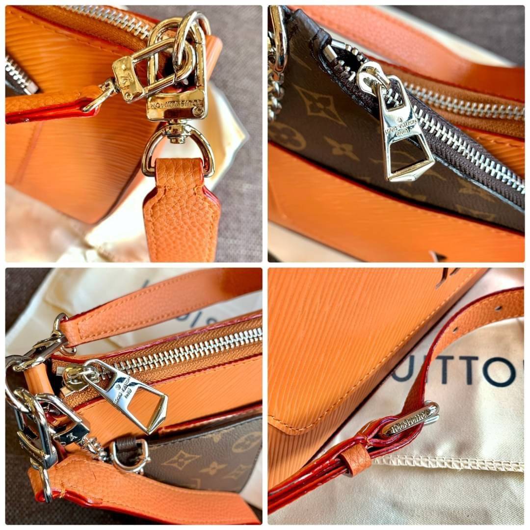 VIP 🥂 LOUIS VUITTON MARELLR EPI LEATHER รุ่นนี้ลายหนังเป็นลายไม้ มีโลโก้แบรนด์แบบฉลุด้านหน้า มาพร้อมกระเป๋าใบลูกแบบซิปจัดเก็บได้ตรงช่องด้านหน้า สามารถถอดออกแยกใช้งานได้ต่างหากนะคะ เปิดปิดกระเป๋าแบบซิป ภายในโล่ง สามารถใส่กระเป๋าเงินใบยาวได้;ของจุกจ