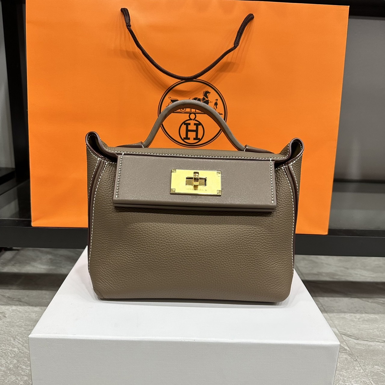 HERMES Hermes 24/24 Mini bag 20cm กระเป๋าถือ/สะพายแบรนด์หรู เอกลักษณ์ของความสง่างาม เกรดออริ สลับแท้ 1:1 ใช้งานต่างประเทศได้