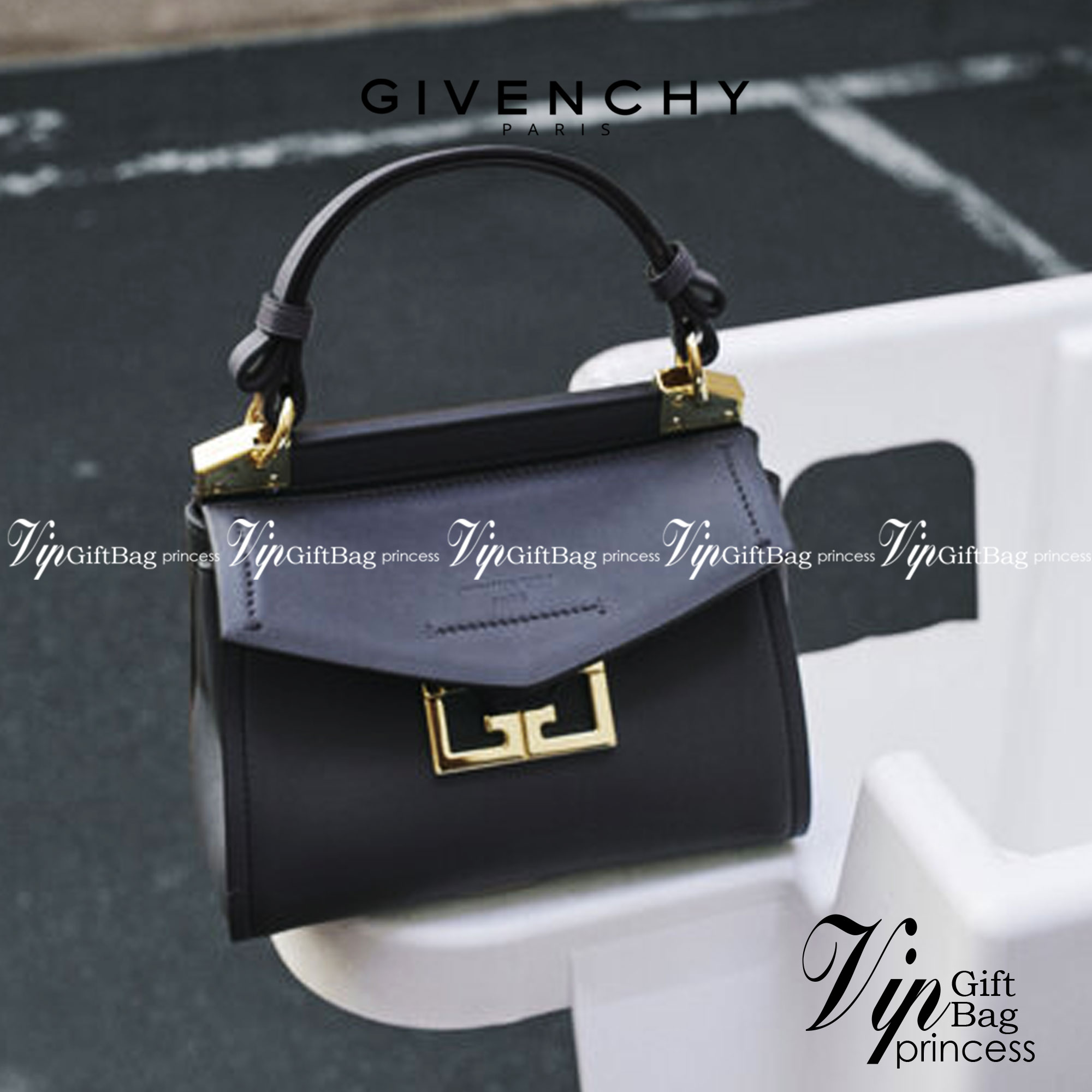 หนังแท้ Givenchy Mini Mystic Calfskin Leather Satchel / Givenchy Top Handle Bag กระเป๋ารุ่นใบใหม่จากแบรนด์หรู การออกแบบเชิงมุมโดดเด่นด้วยแผ่นปิดสามเหลี่ยมที่มีรายละเอียดพร้อมการปิดด้วยแม่เหล็ก double-G พกติดตัวไว้ที่หูหิ้วด้านบนหรือสวมสายสะพายทรงเรียวเพื่