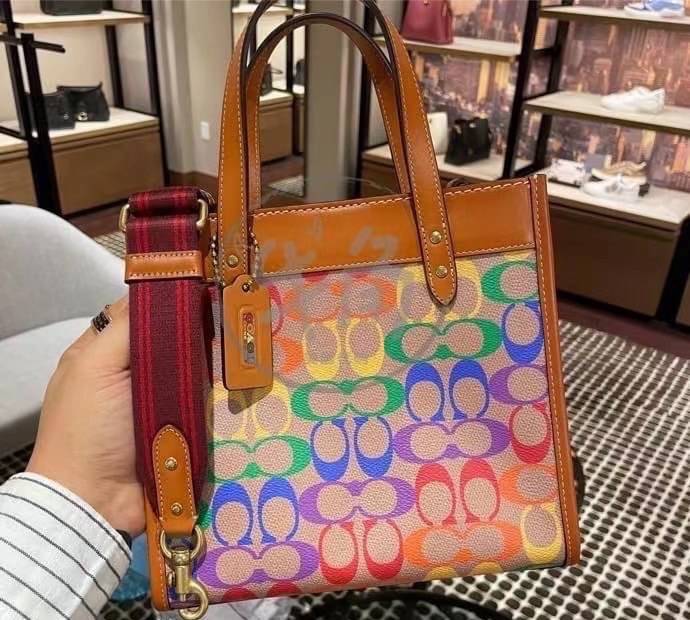 COACH C5142 COACH FIELD TOTE 22 IN RAINBOW SIGNATURE a celebration of equality, and authentic self-expression within the LGBTQIA+ community