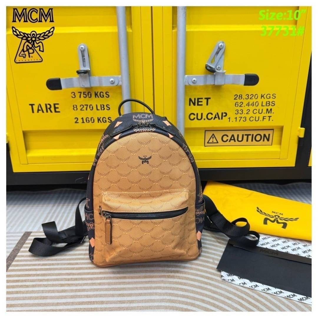 ORI | M.C.M Stark Backpack in Monogram Mix กระเป๋าเป้แมกซี่คอลใหม่ โดดเด่นด้วยดีไซน์สีดำด้านข้างและสายกระเป๋าตัดสีกันได้อย่างลงตัว Best seller Unisex ของงานเป้จริงๆ