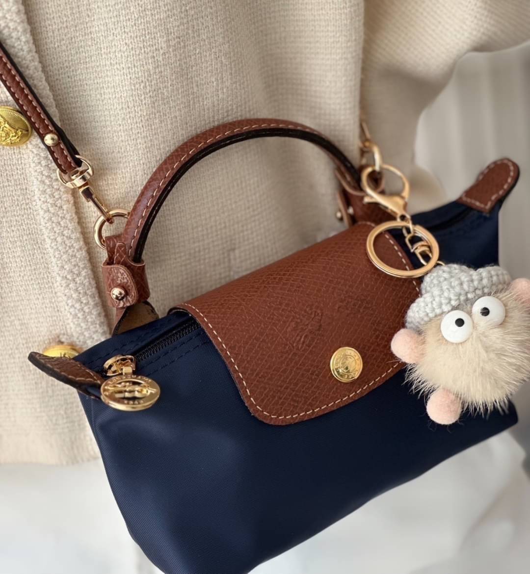 LONGCHAMP LE PLIAGE ORIGINAL Pouch with handle กระเป๋าใบเล็กขนาดกระทัดเหมาะกับใส่ของจำเป็นจุกจิก กันน้ำได้ พร้อมส่ง