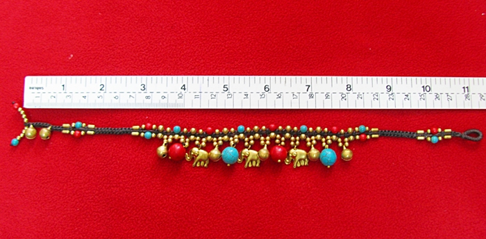 สร้อยข้อเท้าเชือกเทียนหินเทอร์คอยส์สีฟ้าและหินปะการังสีแดง ลูกปัดทองเหลือง ตุ้งติ้งรูปช้างค่ะ