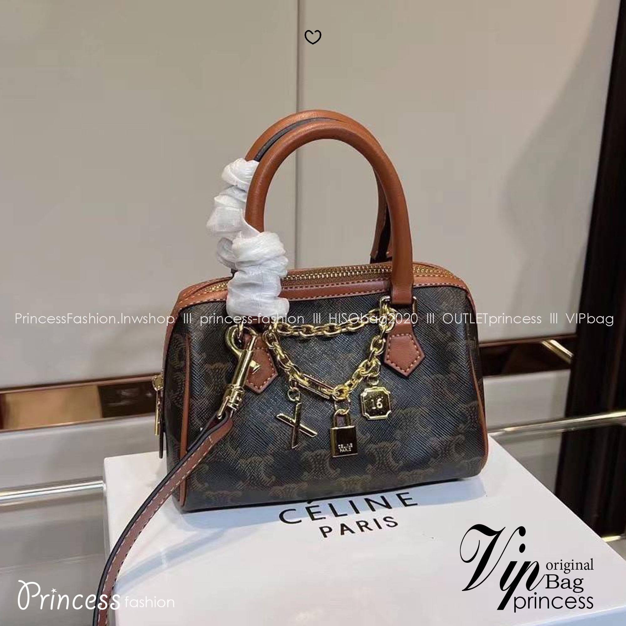 CELINE MINI BOSTON BAG IN TRIOMPHE CANVAS กระเป๋าทรงบอสตันไซส์มินิน่ารัก ประดับสายโซ่สีทอง พร้อมตัวห้อยตกแต่งสวยหรูโดดเด่น