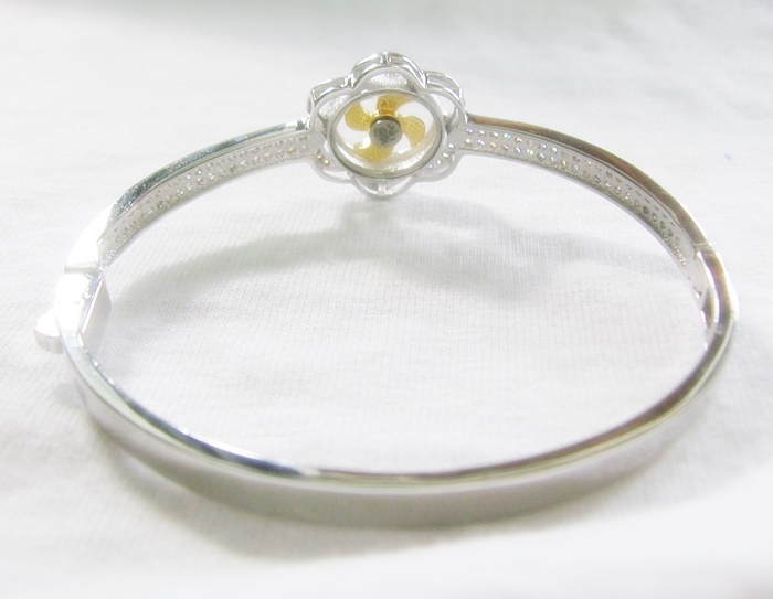 กำไลกังหันดอกเหมยสีเงิน นำโชคเสริมดวงค่ะ