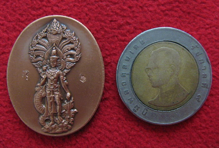 สินค้าหมดค่ะ เหรียญเทพบุตรนาคราช สถาบันพยากรณ์ศาสตร์ เนื้อทองแดงรมดำ(พิมพ์ใหญ่) ขนาด 3.2 เซนติเมตรค่ะ