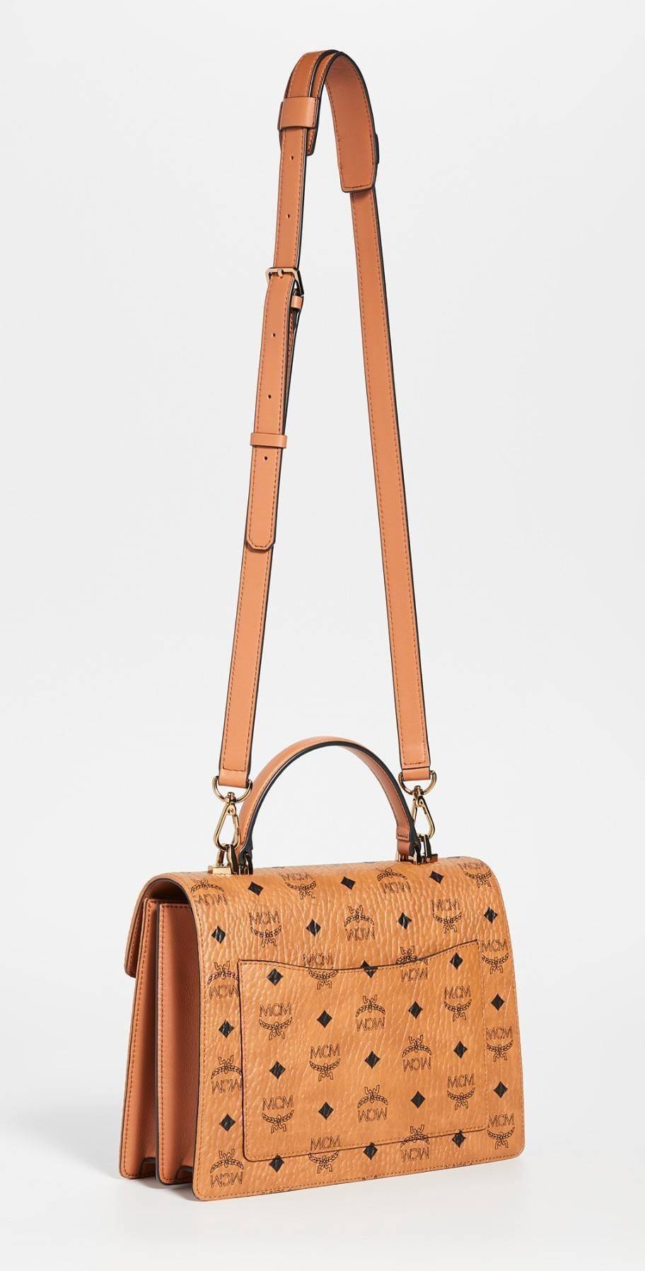 M.C.M MEDIUM PATRICIA SATCHEL IN VISETOS ไซส์กลางมาให้จับต้องแล้วจ้า!! รุ่นที่สาวๆต่างถามหา!! ต้องไอเท็มนี้เลย กระเป๋าถือ/สะพาย ทรงสวยหรู เหมาะกับทุกๆโอกาส ดีไซน์ออกมากึ่งเป็นทางการ แต่ใช้งานได้ทุกสไตล์ วัสดุหนังแคนวาสคุณภาพดีสลับหนังแท้ เปิด-ปิดด้วยตัวกด