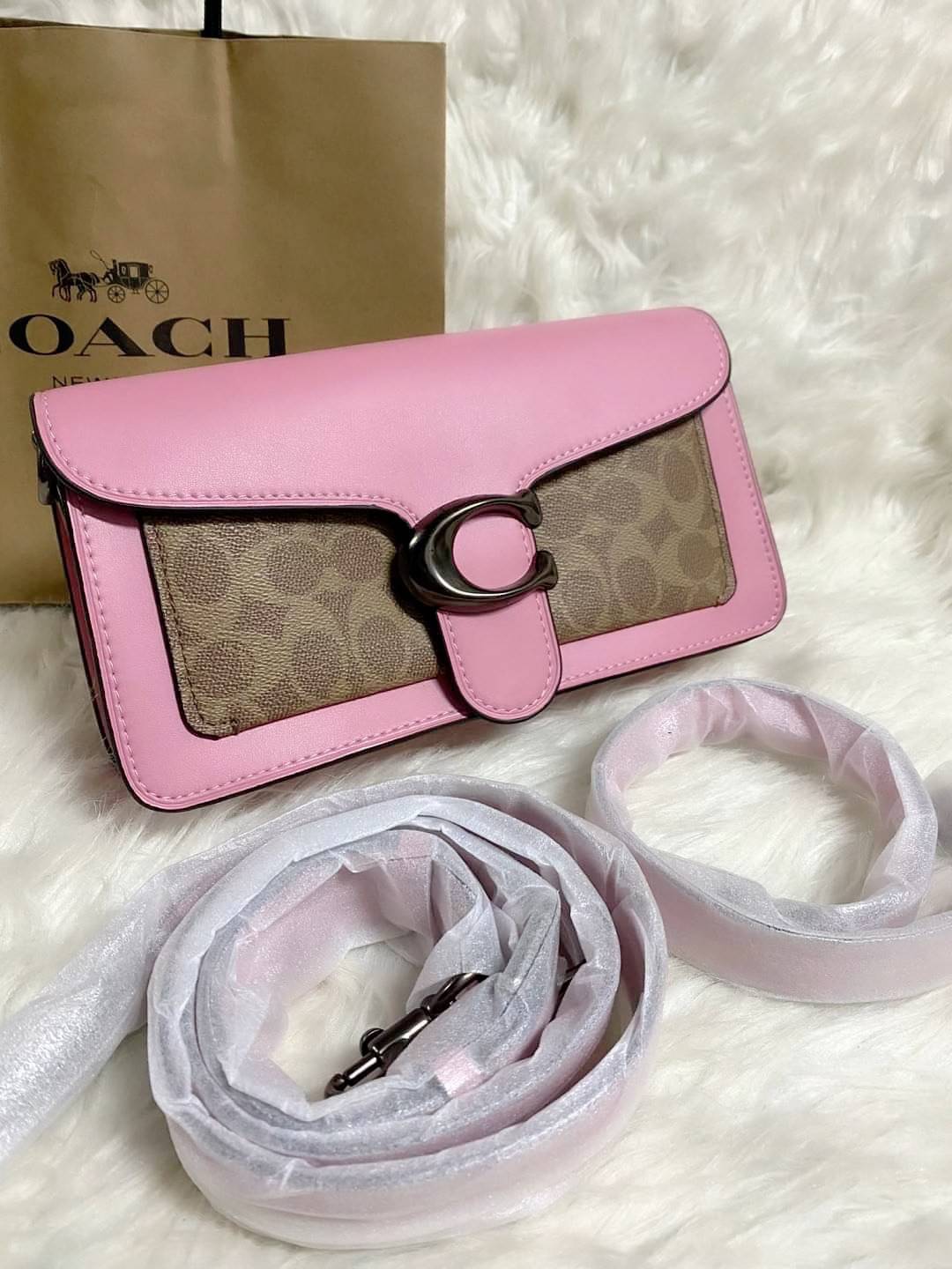 Coach Tabby Shoulder Bag 26 Polished pebble leather, suede and refined calf leather Inside zip and multifunction pockets